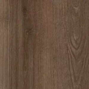 Medium warm brown oak wood-effect LVT with natural vertical grain, small knots and soft cathedral arch pattern HAZELWOOD 7542