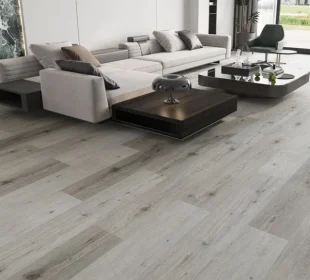 Light gray wood-look LVT flooring installed in a modern living room
