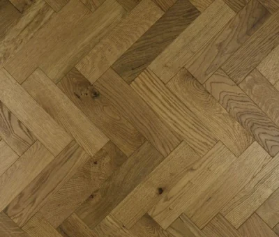 Oak hardwood flooring laid in a herringbone pattern